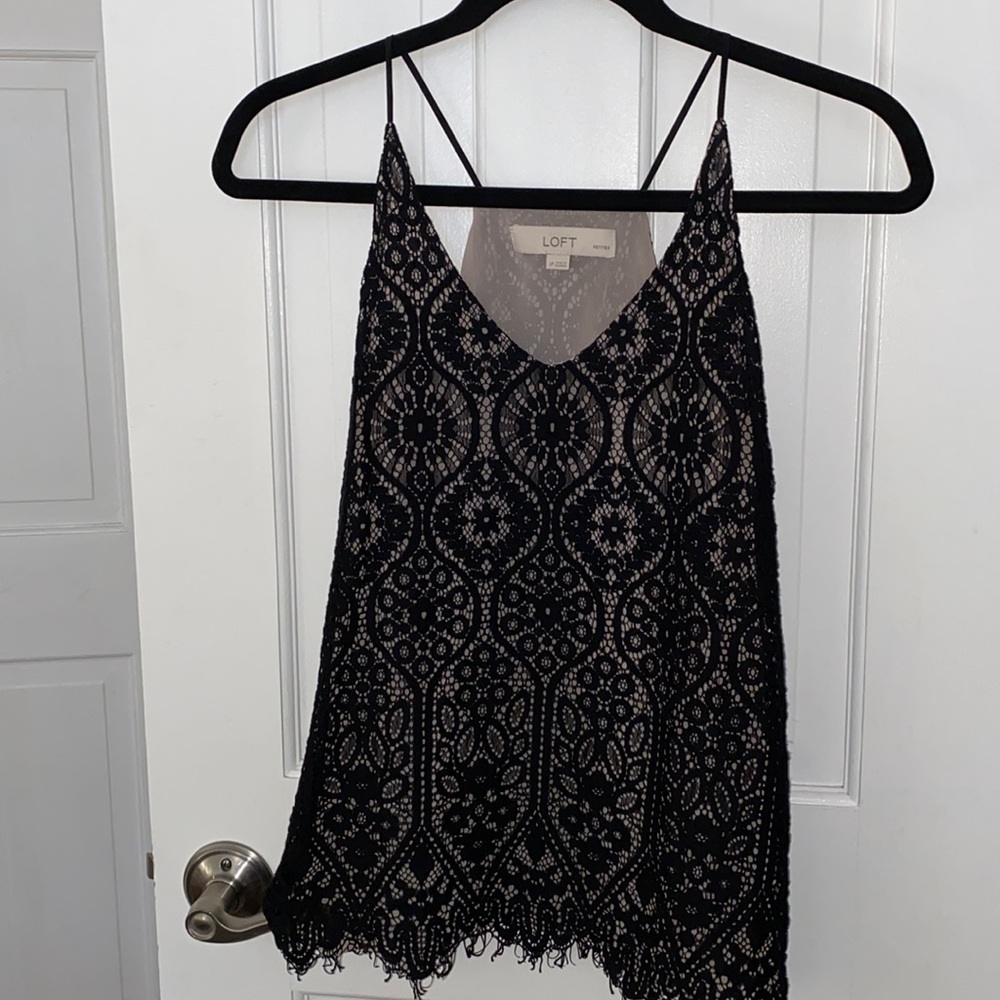 Black lace tank with nude lining underneath.